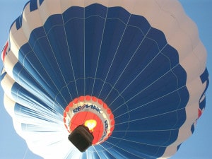 red white and blue hot air balloon from ground
