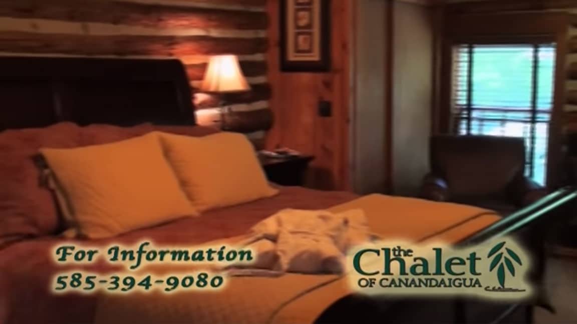 chalet of canandaigua logo overlaying bedroom