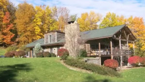 exterior of log cabin; the chalet of canandaigua